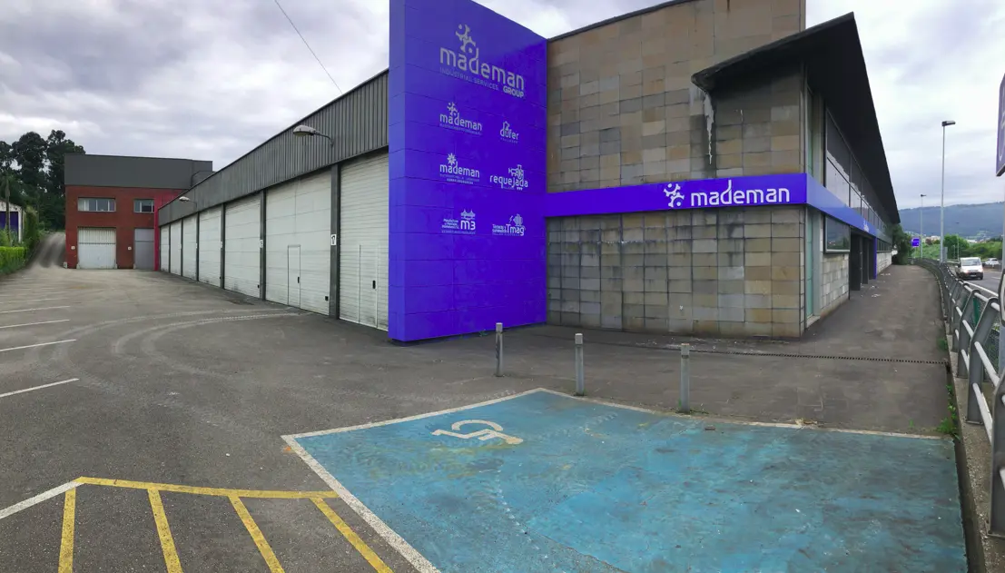 Exterior façade and entrances of the Mademan industrial complex